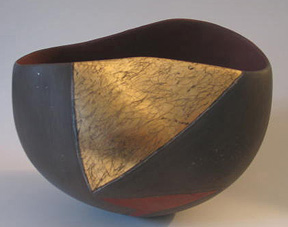 7. Asymmetrical bowl w gold