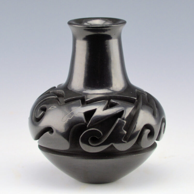 Youngblood, Nancy - Miniature Carved Jar with Avanyu (1988)