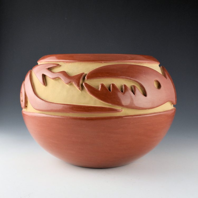 Naranjo, Teresita  - Red Deep Carved Bowl with Old Style Avanyu and Bird (1970s)