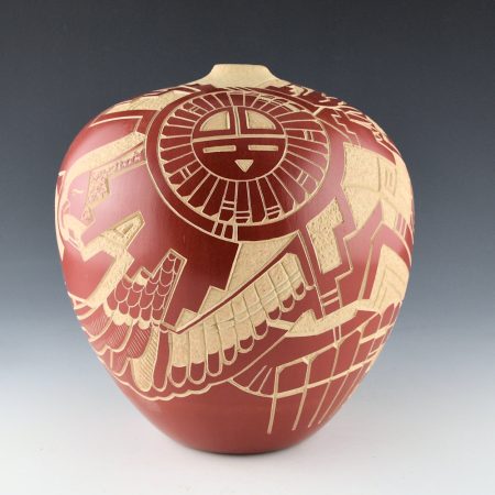 Polacca, Thomas - 8" Tall Red Carved Jar with Eagles and Sun Designs (1976-9)