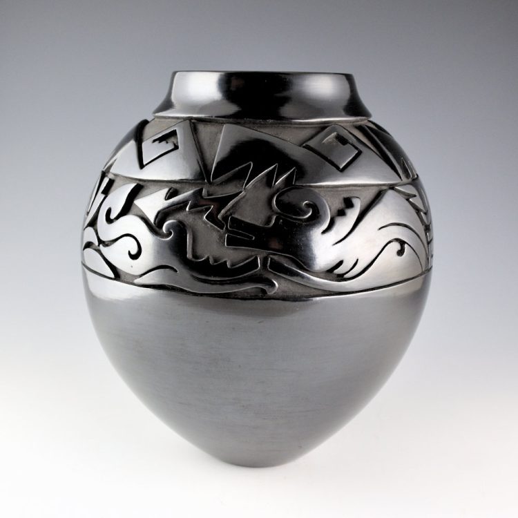Cain, Linda - 10" Tall Jar with Carved Avanyu and Mountains (1993)