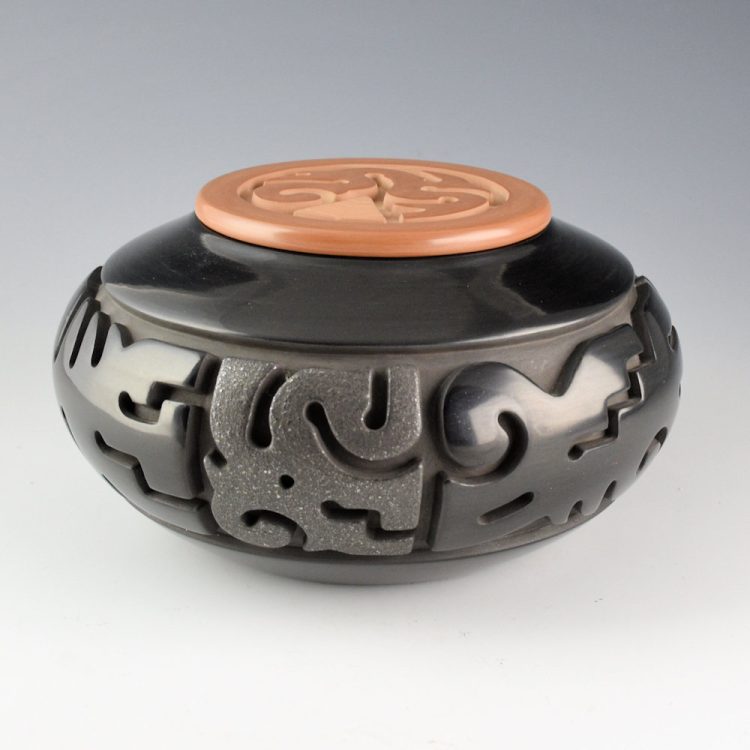 Youngblood, Nathan - Black Jar with Cloud Designs and Tan Lid