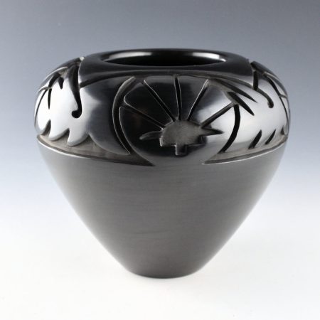 Roller, Toni - Jar with Carved Sun and Feather Design (1979)