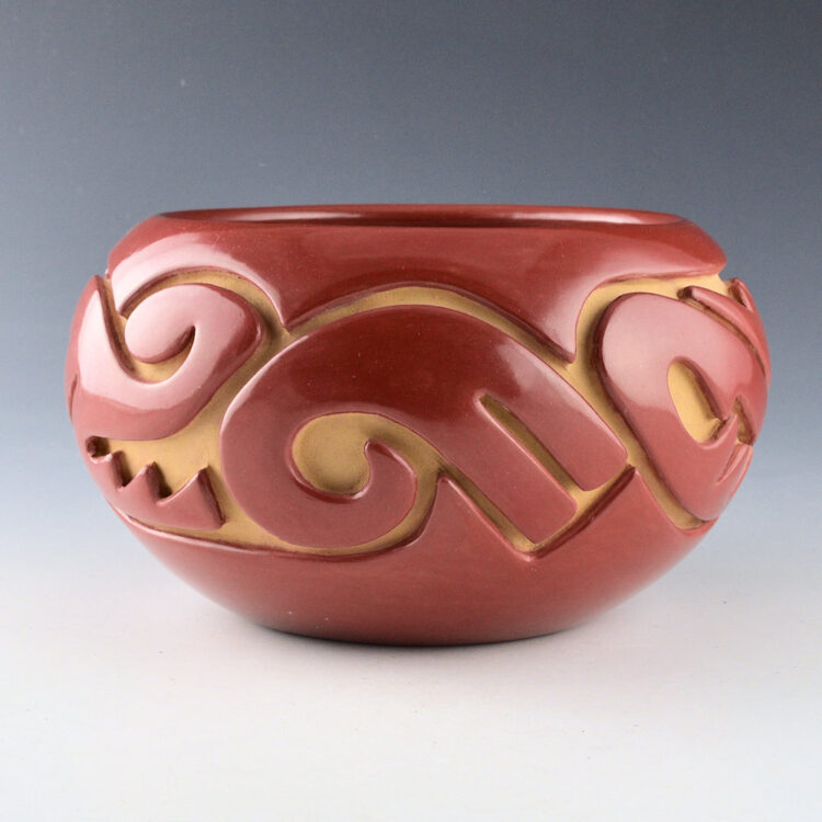 Naranjo, Teresita  - Red Deep Carved Bowl with Swirling Birds and Clouds (1980s)