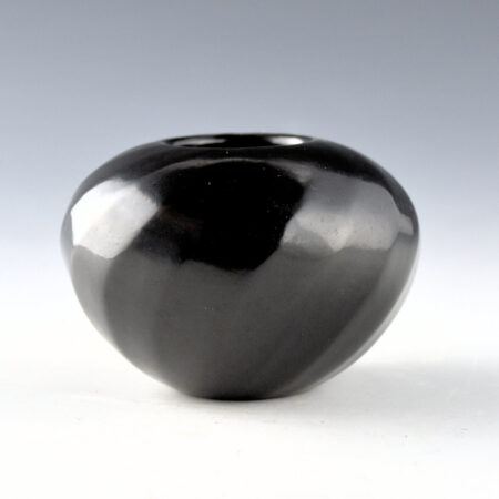 Gutierrez, Denny - Bowl with 16 Faceted Swirling Ribs (1992)