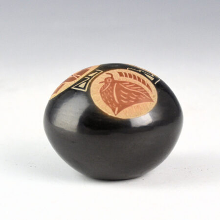 Tapia, Mae - Black and Sienna Seedpot with Rabbit, Quail, and Flute Player