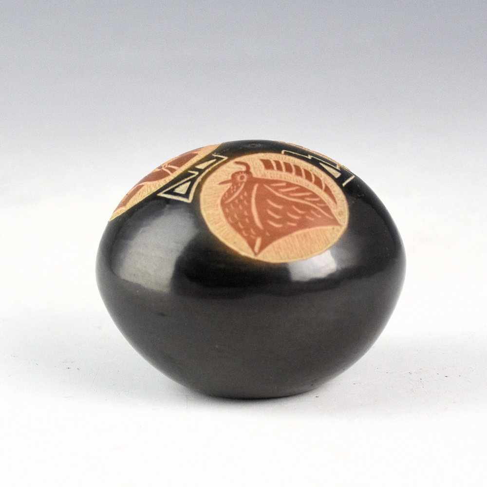 Tapia, Mae - Black and Sienna Seedpot with Rabbit, Quail, and Flute Player