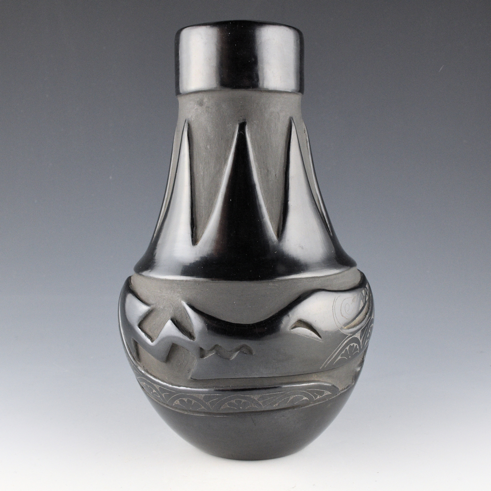 Chavarria, Pablita - 10" Tall Long Neck Jar with Carved Avanyu & Mountains (1970's)