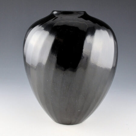 Alternative view of Gutierrez, Denny - 8.5" Tall 32 Faceted Swirling Ribs Melon Jar (1992)