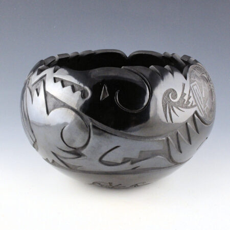 Medicine Flower, Grace - Large Black Carved Bowl with Avanyu and Flute Player (1993)