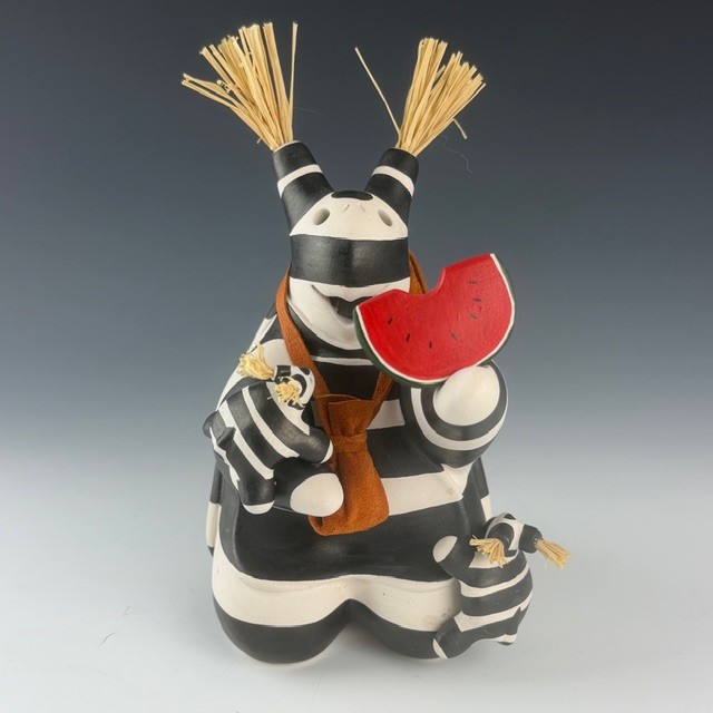 Chitto, Randall – Turtle Storyteller with Two Kids, Watermelon, and Medicine Pouch