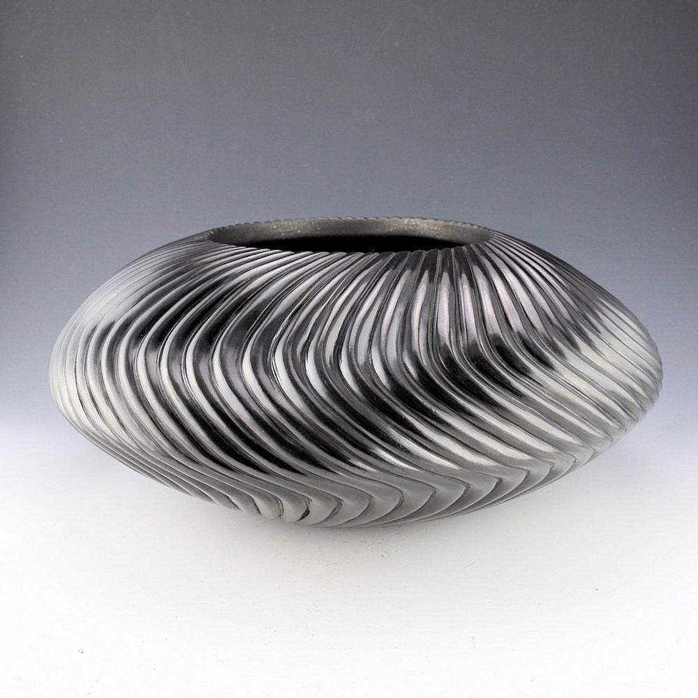 Youngblood, Nancy - 14" Wide 64 Rib "S" Swirl Melon Bowl