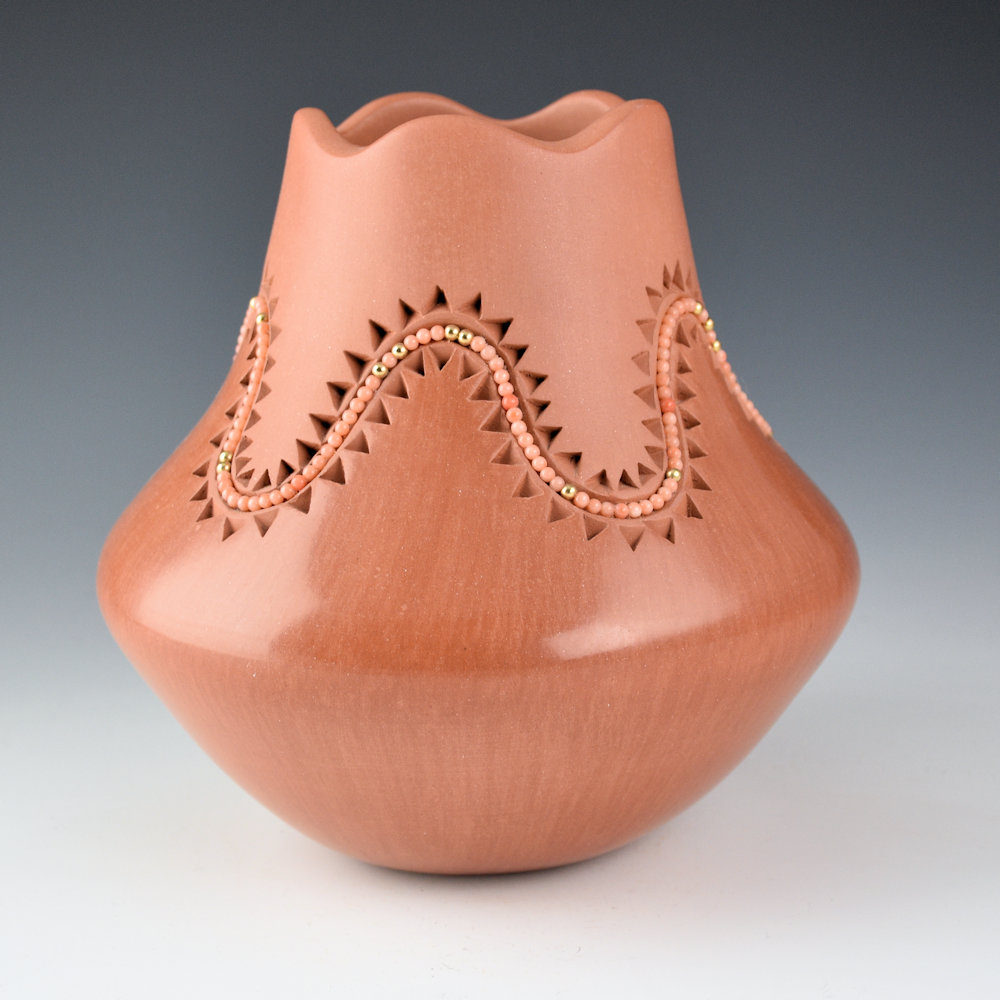 Carpio, Caroline - Red Jar with Carved Mountains, Inset Coral Beads, and Fluted Rim