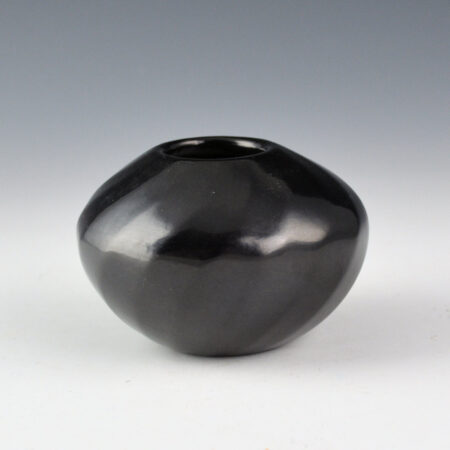 Gutierrez, Denny - Bowl with 16 Faceted Swirling Ribs (1994)
