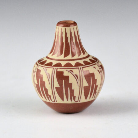 Curran, Dolores - Mini Red Jar with Feather Design